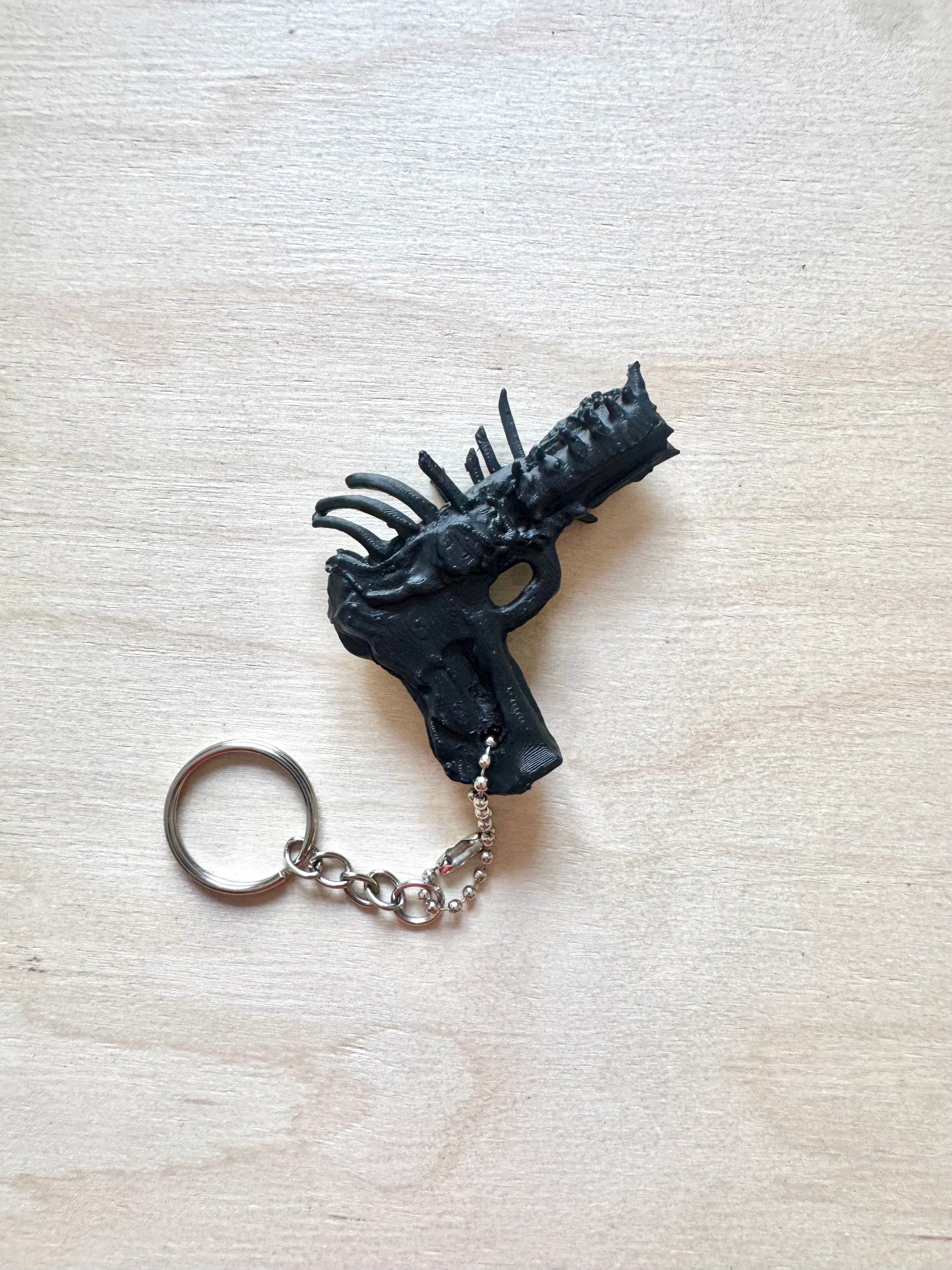 BONES PISTOL KEYCHAIN — Porte-clés sculpture miniature
